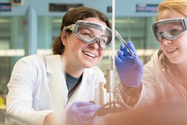 Two students working in a laboratory 