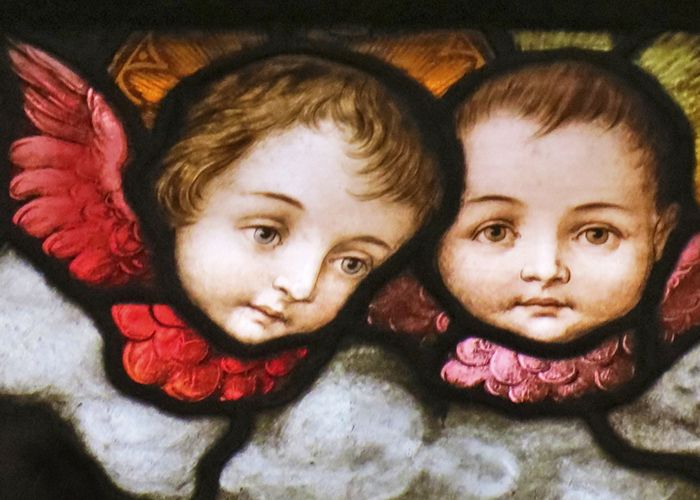 Two cherubs in stained glass at Gesu Church