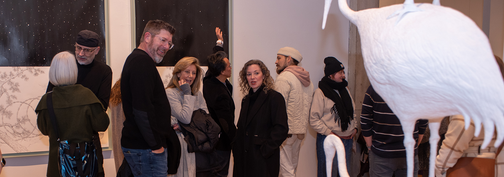 image of visitors enjoying art