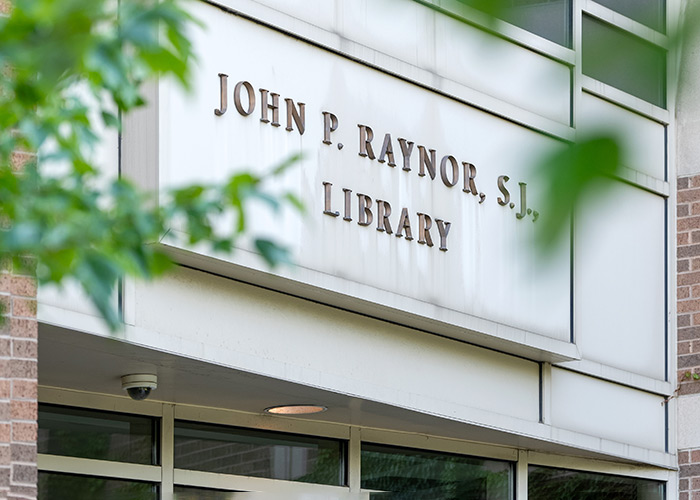 Building signage for Raynor Library