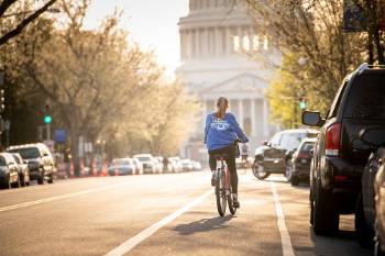 Marquette student on bike in Washington, D.C.