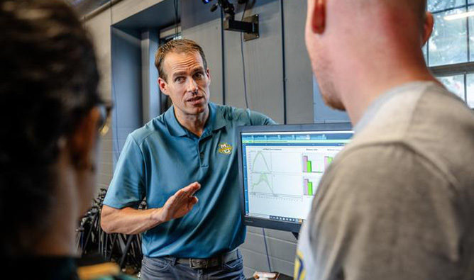 Instructor talking to students by computer