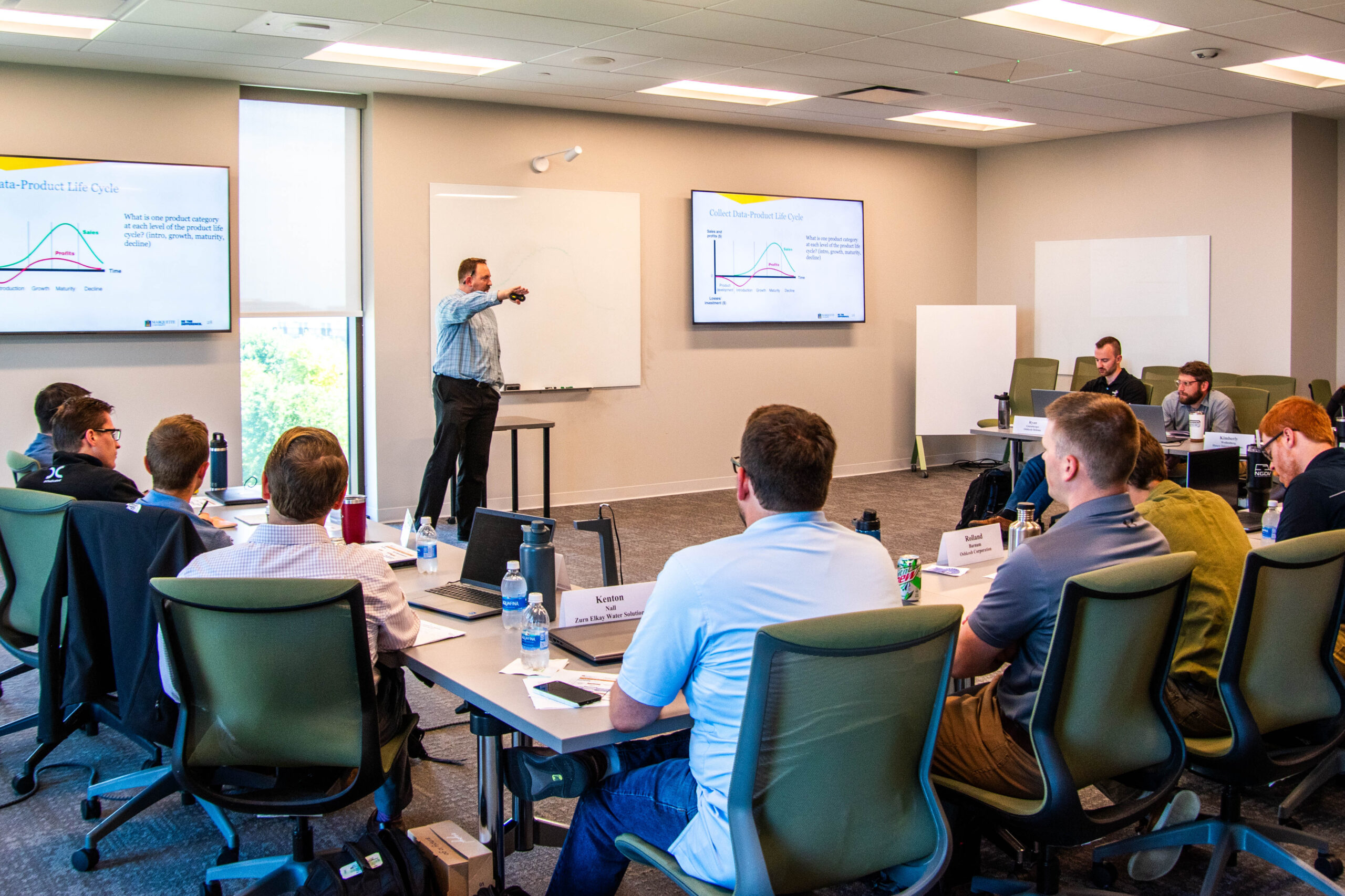 Dr. Alex Milovic speaks to a class of Bridge to Business engineers