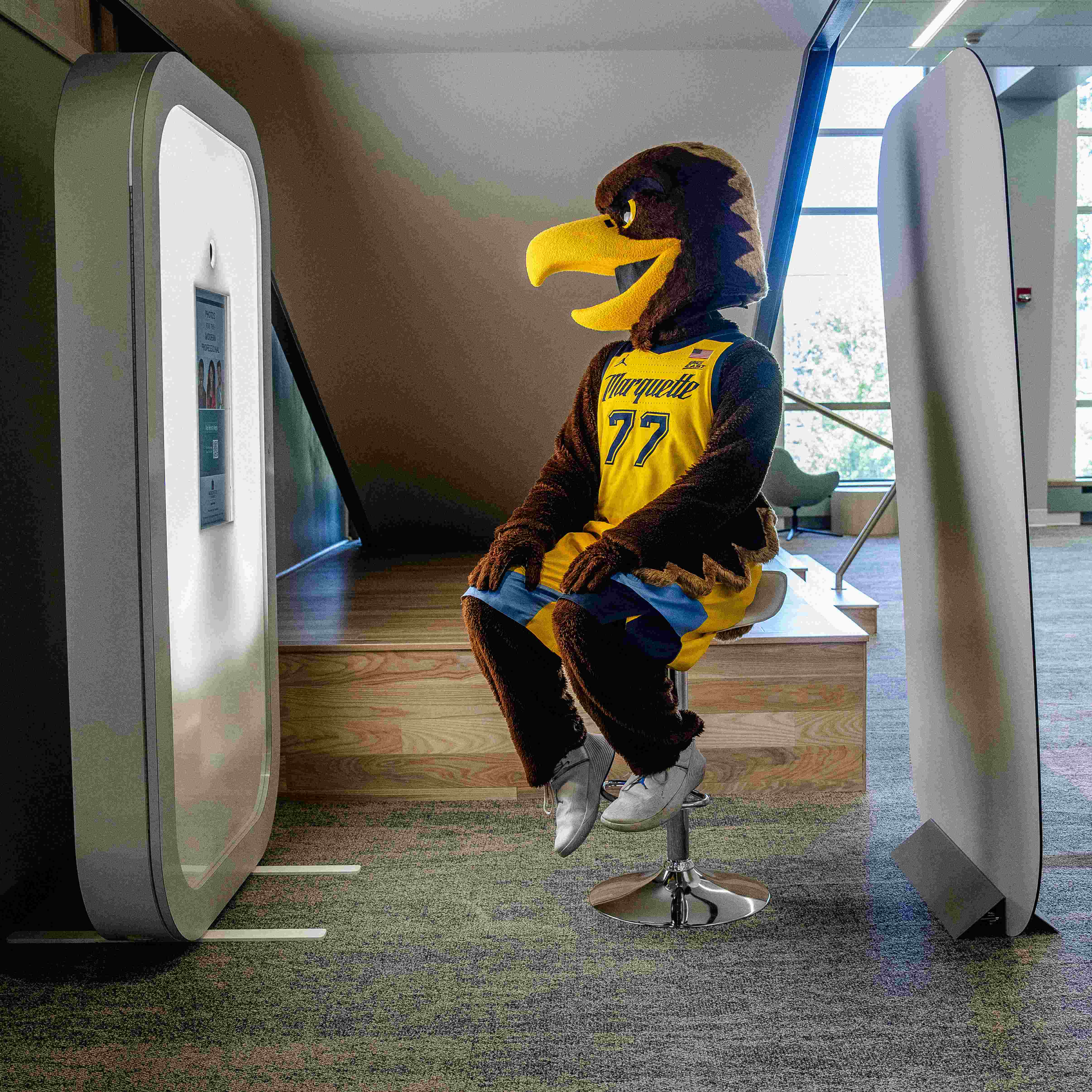 Iggy, Marquette's Golden Eagle, poses for a photo at the Booth in the Lemonis Center