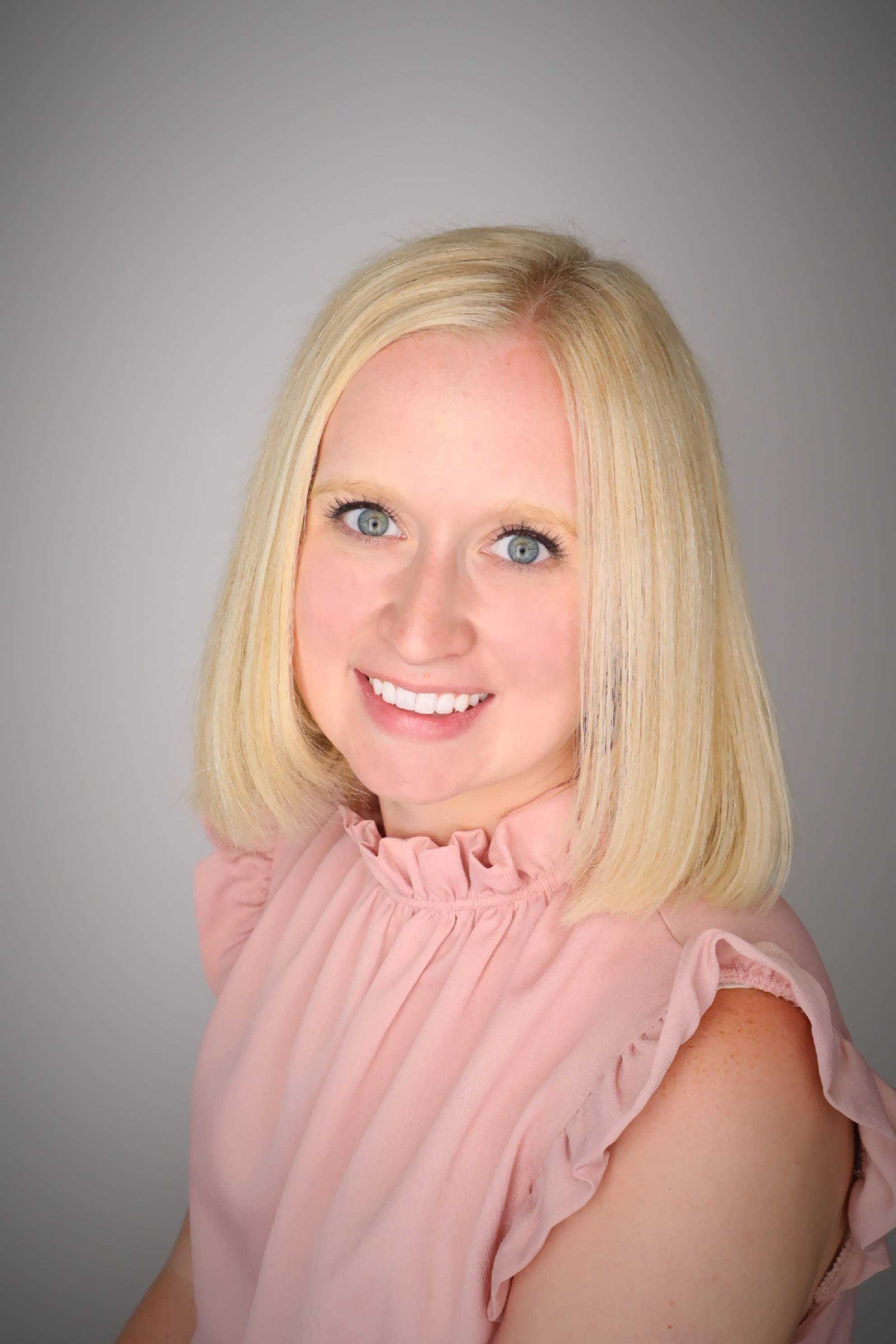 A career counselor smiles for a professional photo