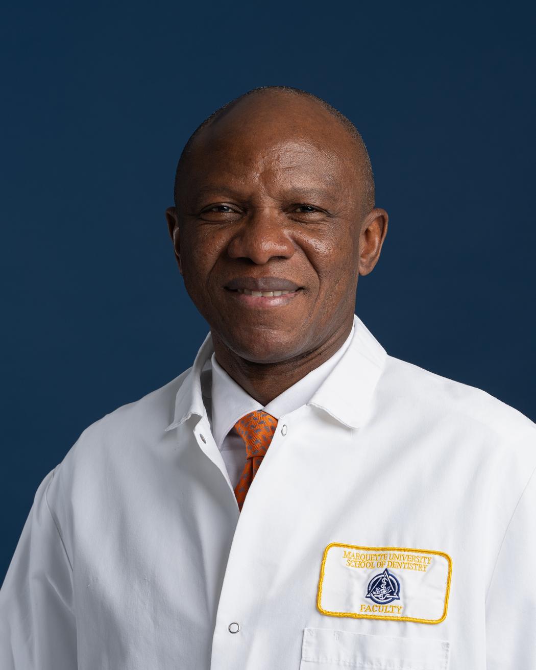 Dr. Christopher Okunseri