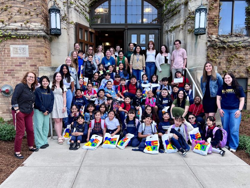 group of teachers and children