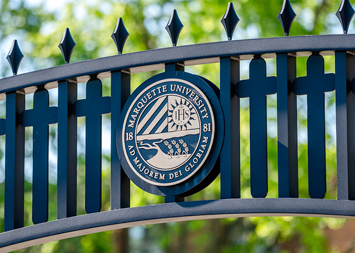 University seal on the Wisconsin Avenue arch