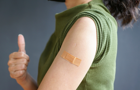 closeup of shoulder with bandaid