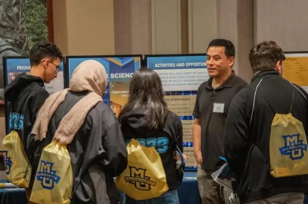 students meeting instructor during discovery days 